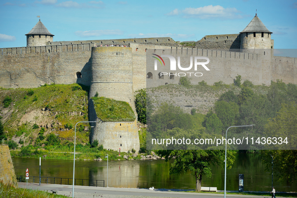 The Ivangorod Fortress is seen across the Narva River in Narva, Estonia on 24 July, 2024. Estonian authorities have closed the bridge that c...