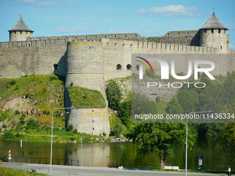 The Ivangorod Fortress is seen across the Narva River in Narva, Estonia on 24 July, 2024. Estonian authorities have closed the bridge that c...