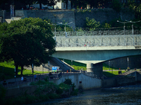 An Estonian police vehicle is seen near the bridge over the Narva River in Narva, Estonia on 24 July, 2024. Estonian authorities have closed...