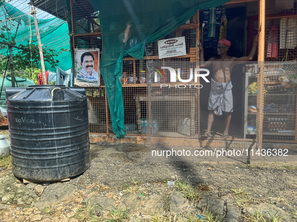 The shopkeeper is waiting for customers at his small roadside shop in Pathanamthitta, Kerala, India, on April 05, 2024. 