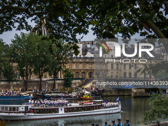 The Olympic Games of Paris 2024 are realizing the historical opening in Paris, France, on July 26, 2024. Boats with all 205 countries repres...