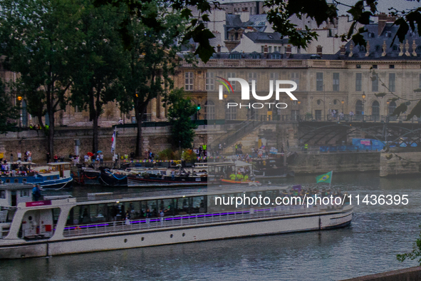 The Olympic Games of Paris 2024 are realizing the historical opening in Paris, France, on July 26, 2024. Boats with all 205 countries repres...