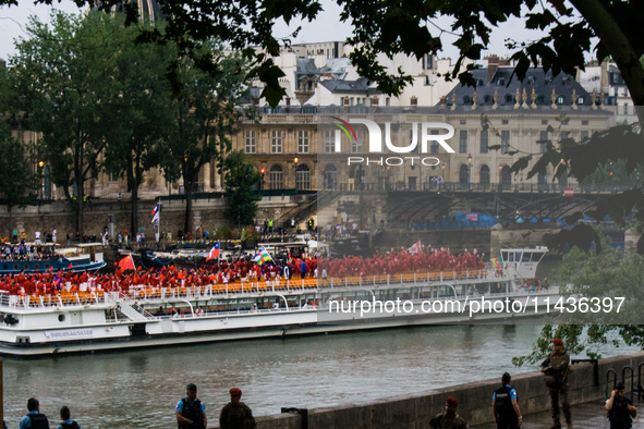 The Olympic Games of Paris 2024 are realizing the historical opening in Paris, France, on July 26, 2024. Boats with all 205 countries repres...