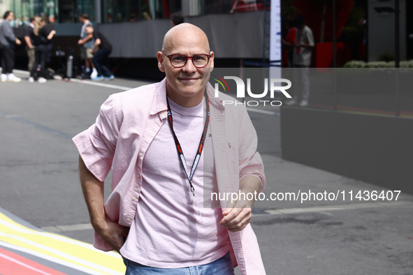 Jacques Villeneuve poses for a photo before first practice ahead of the Formula 1 Belgian Grand Prix at Spa-Francorchamps in Spa, Belgium on...