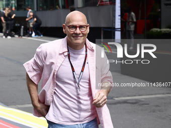 Jacques Villeneuve poses for a photo before first practice ahead of the Formula 1 Belgian Grand Prix at Spa-Francorchamps in Spa, Belgium on...