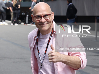 Jacques Villeneuve poses for a photo before first practice ahead of the Formula 1 Belgian Grand Prix at Spa-Francorchamps in Spa, Belgium on...