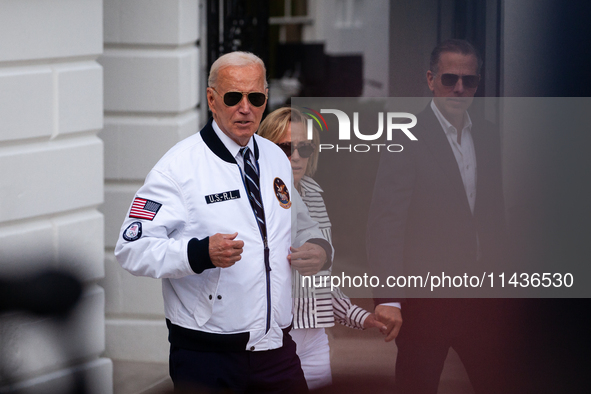 President Joe Biden boards Marine One with son Hunter Biden and daugher-in-law Melissa Cohen Biden at the White House, en route to Camp Davi...