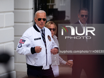 President Joe Biden boards Marine One with son Hunter Biden and daugher-in-law Melissa Cohen Biden at the White House, en route to Camp Davi...