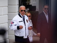 President Joe Biden boards Marine One with son Hunter Biden and daugher-in-law Melissa Cohen Biden at the White House, en route to Camp Davi...