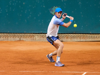 Vilius Gaubas from Lithuania is in action during the Internazionali di Verona - ATP Challenger 100 tennis tournament at Sports Club Verona i...