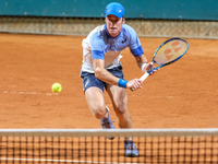 Vilius Gaubas from Lithuania is in action during the Internazionali di Verona - ATP Challenger 100 tennis tournament at Sports Club Verona i...