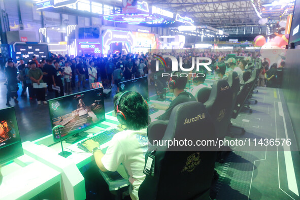 Visitors are participating in an e-sports competition at ChinaJoy 2024 in Shanghai, China, on July 26, 2024. 