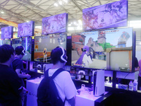 Players are playing a new PS5 game at the SONY exhibition area at ChinaJoy 2024 in Shanghai, China, on July 26, 2024. (