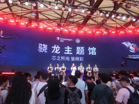 Players are experiencing the latest AI esports hardware devices at the Qualcomm Snapdragon theme Hall at ChinaJoy 2024 in Shanghai, China, o...