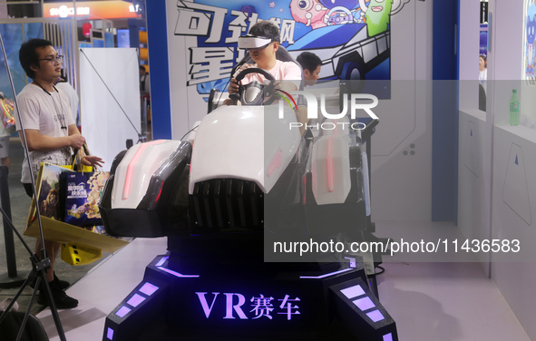 A new VR racing game is attracting fans to experience it at ChinaJoy 2024 in Shanghai, China, on July 26, 2024. 