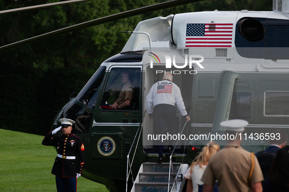 President Joe Biden boards Marine One at the White House, en route to Camp David, Washington, DC, July 26, 2024.  Coinciding with opening ce...