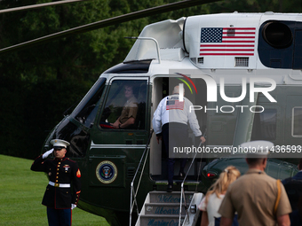 President Joe Biden boards Marine One at the White House, en route to Camp David, Washington, DC, July 26, 2024.  Coinciding with opening ce...