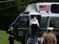 President Joe Biden boards Marine One at the White House, en route to Camp David, Washington, DC, July 26, 2024.  Coinciding with opening ce...