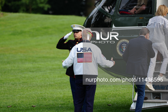 President Biden Wears US Olympic Team Attire As He Boards Marine One With His Sister Valerie Biden Owen's And Son Hunter Biden, in Washingto...