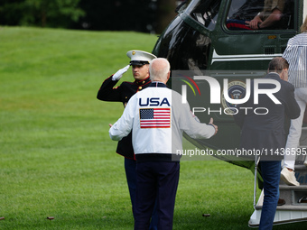 President Biden Wears US Olympic Team Attire As He Boards Marine One With His Sister Valerie Biden Owen's And Son Hunter Biden, in Washingto...