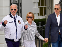 President Biden Wears US Olympic Team Attire As He Boards Marine One With His Sister Valerie Biden Owen's And Son Hunter Biden, in Washingto...