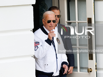 U.S. President Joe Biden, wearing a Team USA 2024 Olympics jacket, departs the White House to board Marine One en route to Camp David on Jul...