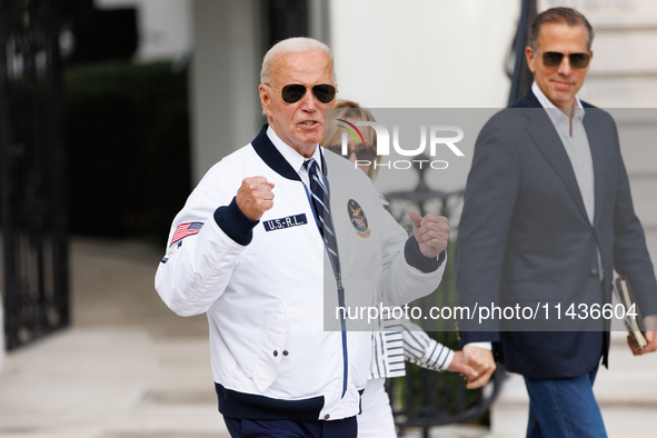 U.S. President Joe Biden, wearing a Team USA 2024 Olympics jacket, departs the White House, accompanied by his sister Valerie Biden Owens an...