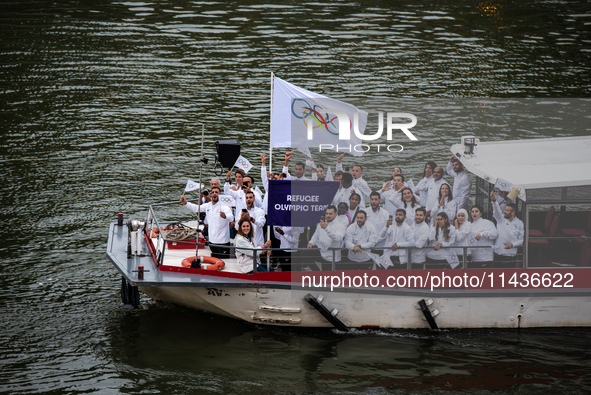 The boat is transporting the Refugee Olympic Team during the opening ceremony of the Paris Olympic Games in Paris, France, on July 26, 2024....