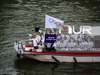 The boat is transporting the Refugee Olympic Team during the opening ceremony of the Paris Olympic Games in Paris, France, on July 26, 2024....