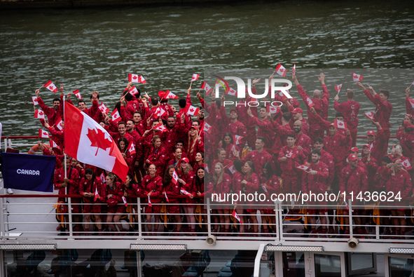 The boat is carrying the Canadian Olympic Team during the opening ceremony of the Paris Olympic Games in Paris, France, on July 26, 2024. 