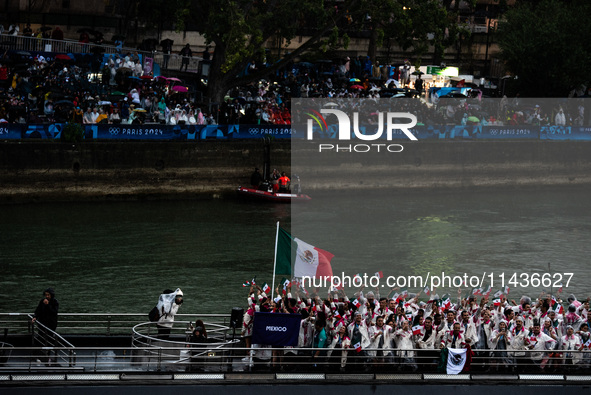 The boat carrying the Mexican Olympic team is sailing down the Seine during the opening ceremony of the Paris 2024 Olympics in Paris, France...