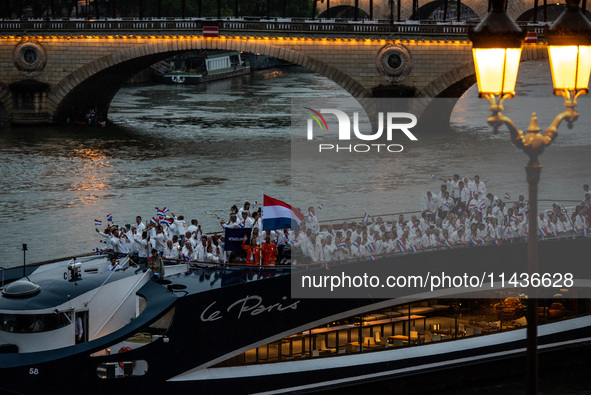 The boat carrying the Dutch Olympic team is sailing down the Seine on a boat called Le Paris, during the opening ceremony of the Paris 2024...