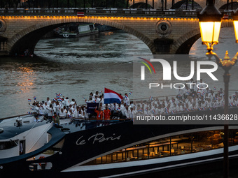 The boat carrying the Dutch Olympic team is sailing down the Seine on a boat called Le Paris, during the opening ceremony of the Paris 2024...