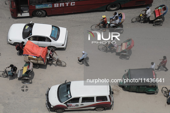 A man is commuting to work at Motijheel Financial District as government and non-government offices are opening today after 4 days following...