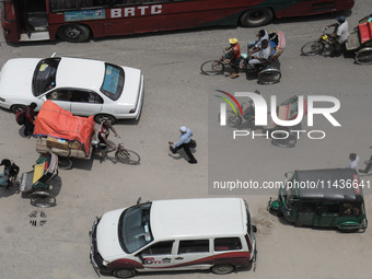 A man is commuting to work at Motijheel Financial District as government and non-government offices are opening today after 4 days following...