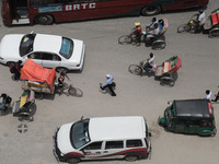 A man is commuting to work at Motijheel Financial District as government and non-government offices are opening today after 4 days following...