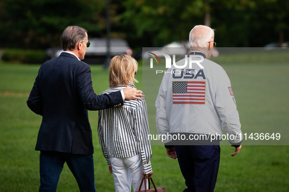 President Joe Biden boards Marine One with son Hunter Biden and daugher-in-law Melissa Cohen Biden at the White House, en route to Camp Davi...