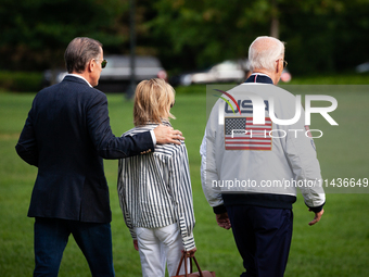 President Joe Biden boards Marine One with son Hunter Biden and daugher-in-law Melissa Cohen Biden at the White House, en route to Camp Davi...