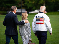 President Joe Biden boards Marine One with son Hunter Biden and daugher-in-law Melissa Cohen Biden at the White House, en route to Camp Davi...