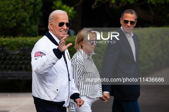 President Joe Biden boards Marine One with son Hunter Biden and sister Valerie Biden Owens at the White House, en route to Camp David, Washi...