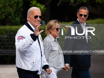 President Joe Biden boards Marine One with son Hunter Biden and sister Valerie Biden Owens at the White House, en route to Camp David, Washi...