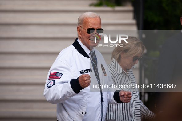 President Joe Biden boards Marine One sister Valerie Biden Owens at the White House, en route to Camp David, Washington, DC, July 26, 2024....