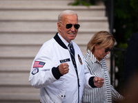 President Joe Biden boards Marine One sister Valerie Biden Owens at the White House, en route to Camp David, Washington, DC, July 26, 2024....