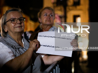 People are protesting against the screening of the film ''Green Border'' by Agnieszka Holland on the Main Square during the New Horizons Int...