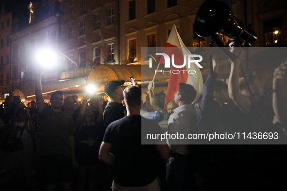 People are protesting against the screening of the film ''Green Border'' by Agnieszka Holland on the Main Square during the New Horizons Int...