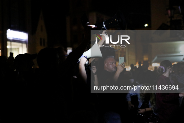 People are protesting against the screening of the film ''Green Border'' by Agnieszka Holland on the Main Square during the New Horizons Int...