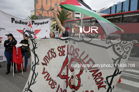 Mothers, fathers, and relatives of students from the Isidro Burgos Normal School in Ayotzinapa are demonstrating in Mexico City, Mexico, to...