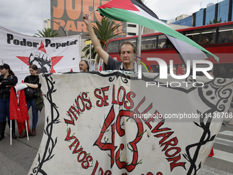 Mothers, fathers, and relatives of students from the Isidro Burgos Normal School in Ayotzinapa are demonstrating in Mexico City, Mexico, to...