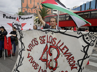 Mothers, fathers, and relatives of students from the Isidro Burgos Normal School in Ayotzinapa are demonstrating in Mexico City, Mexico, to...