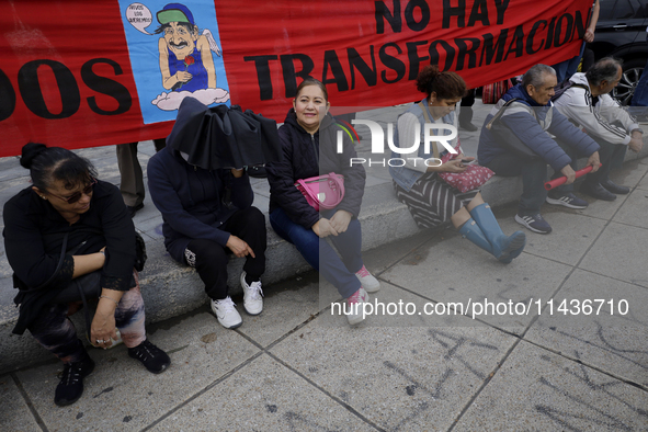 Mothers, fathers, and relatives of students from the Isidro Burgos Normal School in Ayotzinapa are demonstrating in Mexico City, Mexico, to...